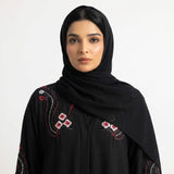 Side profile of Black Crimson Flora Paisley Coat highlighting the silhouette