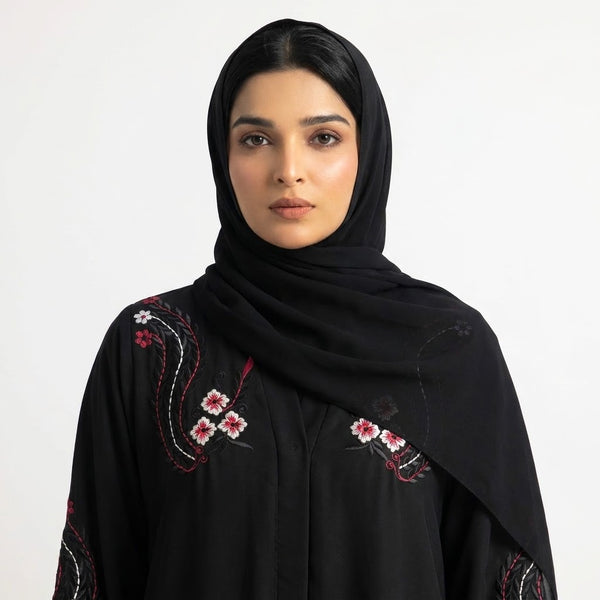 Side profile of Black Crimson Flora Paisley Coat highlighting the silhouette
