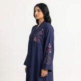 Side profile of Navy Crimson Flora Paisley Coat highlighting the silhouette