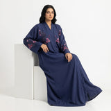 Full-length view of Navy Crimson Flora Paisley Coat in Deep Royal Navy Blue base with Crimson Pink, Rose Pink, and Slate Blue thread embroidery