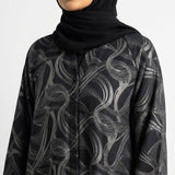 Close-up detail of Silver Wave Swirl Coat showcasing the design work