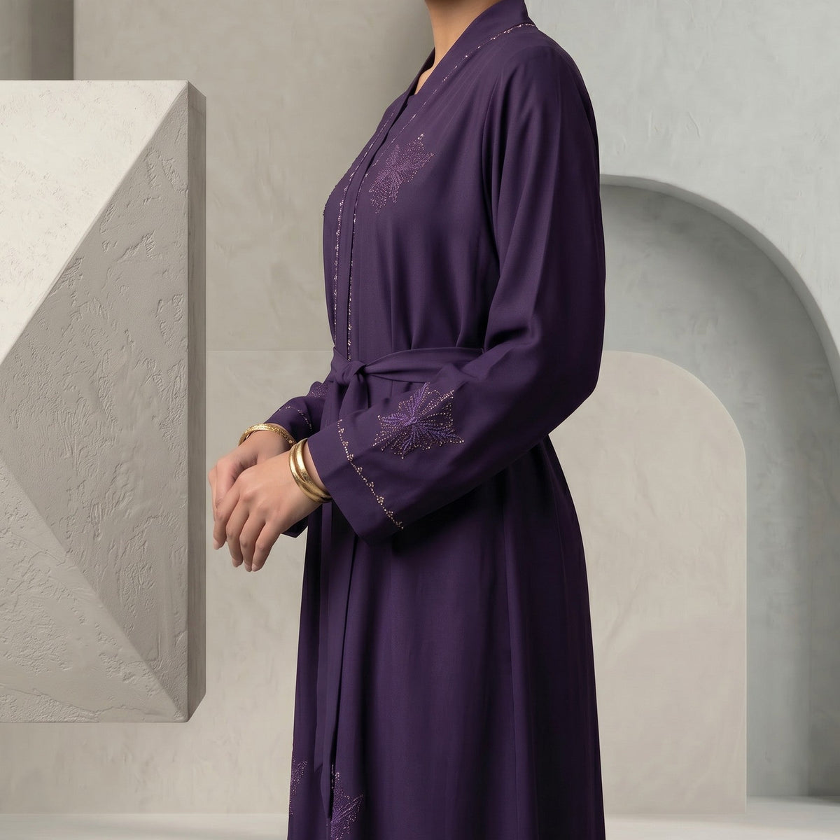 Side view of Regal Eggplant Belted Abaya highlighting cinched waist silhouette