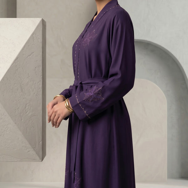 Side view of Regal Eggplant Belted Abaya highlighting cinched waist silhouette