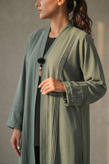 Close-up detail of Sage Green Pleated Buckle Abaya showcasing statement buckle hardware