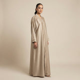 Close-up detail of Golden Cascade Abaya showcasing the design work