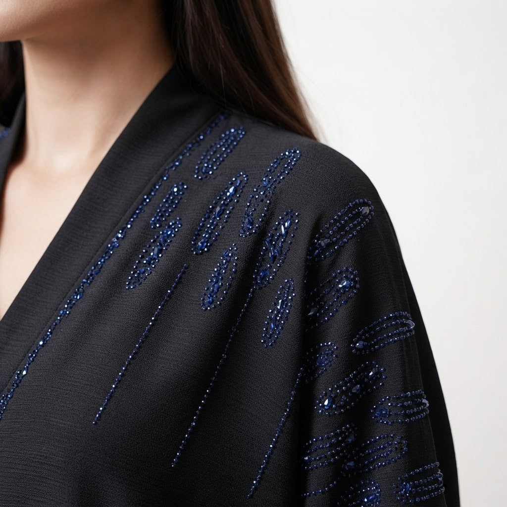 Front view of Onyx Cascade Abaya - premium Premium TikTok Fabric (lightweight, highly durable, wrinkle-resistant, and drapes gracefully). modest wear