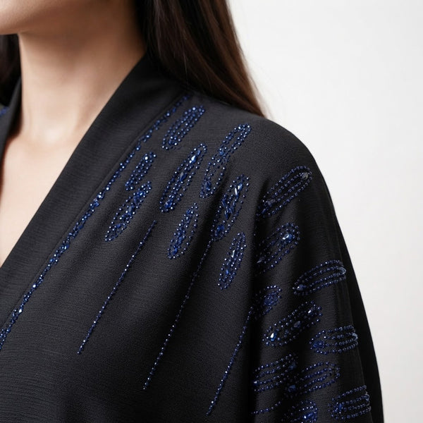 Front view of Onyx Cascade Abaya - premium Premium TikTok Fabric (lightweight, highly durable, wrinkle-resistant, and drapes gracefully). modest wear