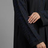 Side profile of Onyx Cascade Abaya highlighting the silhouette