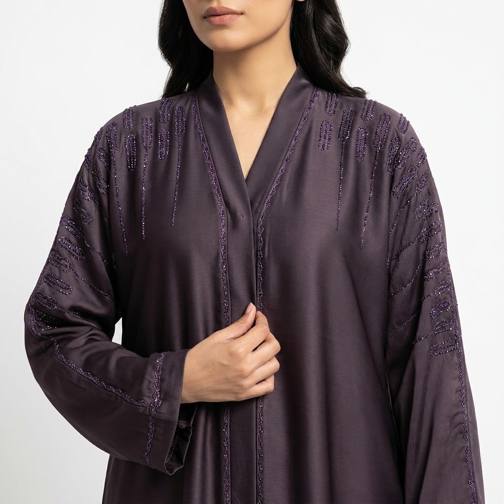 Close-up detail of Deep Plum Cascade Abaya showcasing the design work