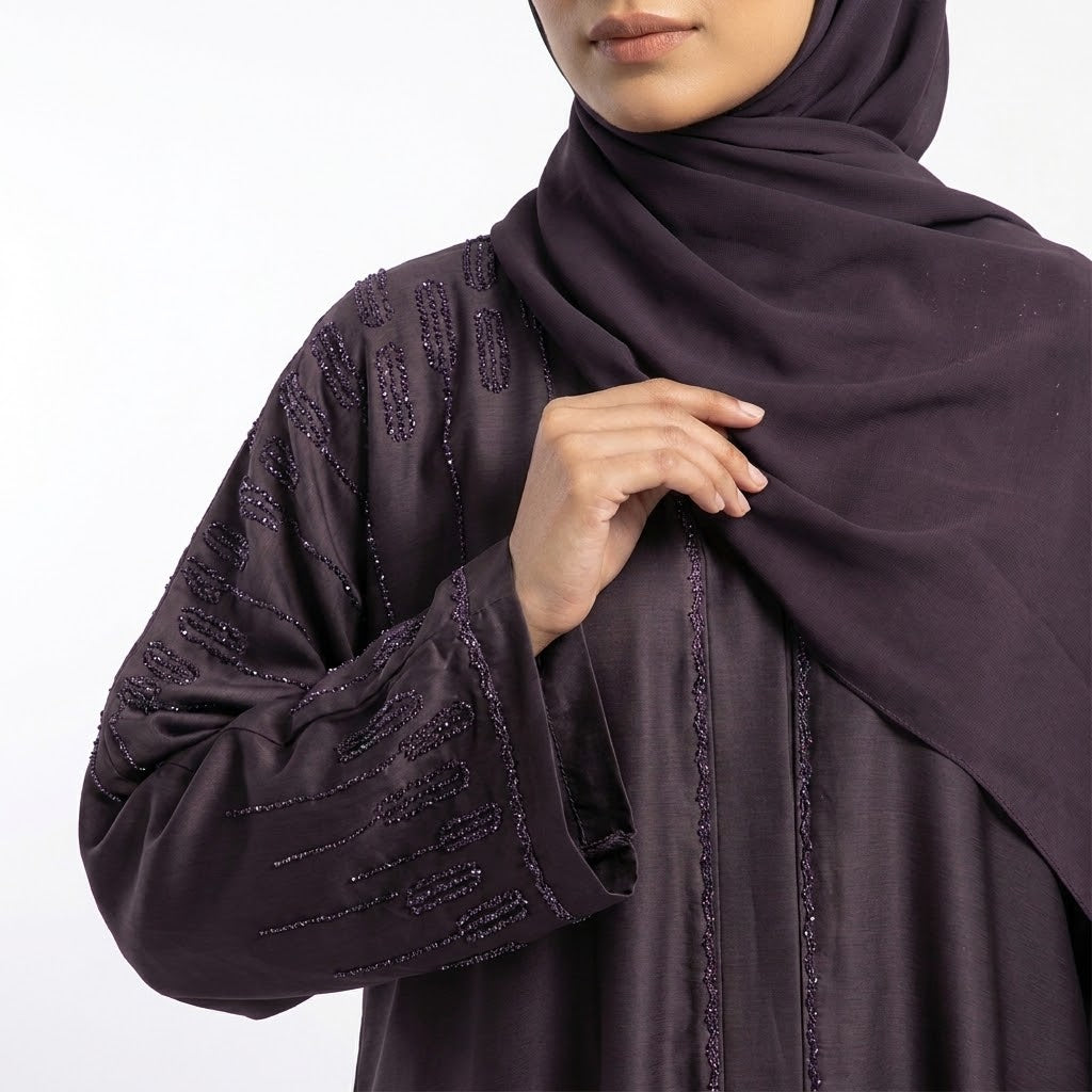 Styled look of Deep Plum Cascade Abaya, perfect for ideal for formal gatherings, evening wear, and festive events