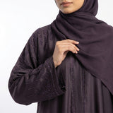 Styled look of Deep Plum Cascade Abaya, perfect for ideal for formal gatherings, evening wear, and festive events
