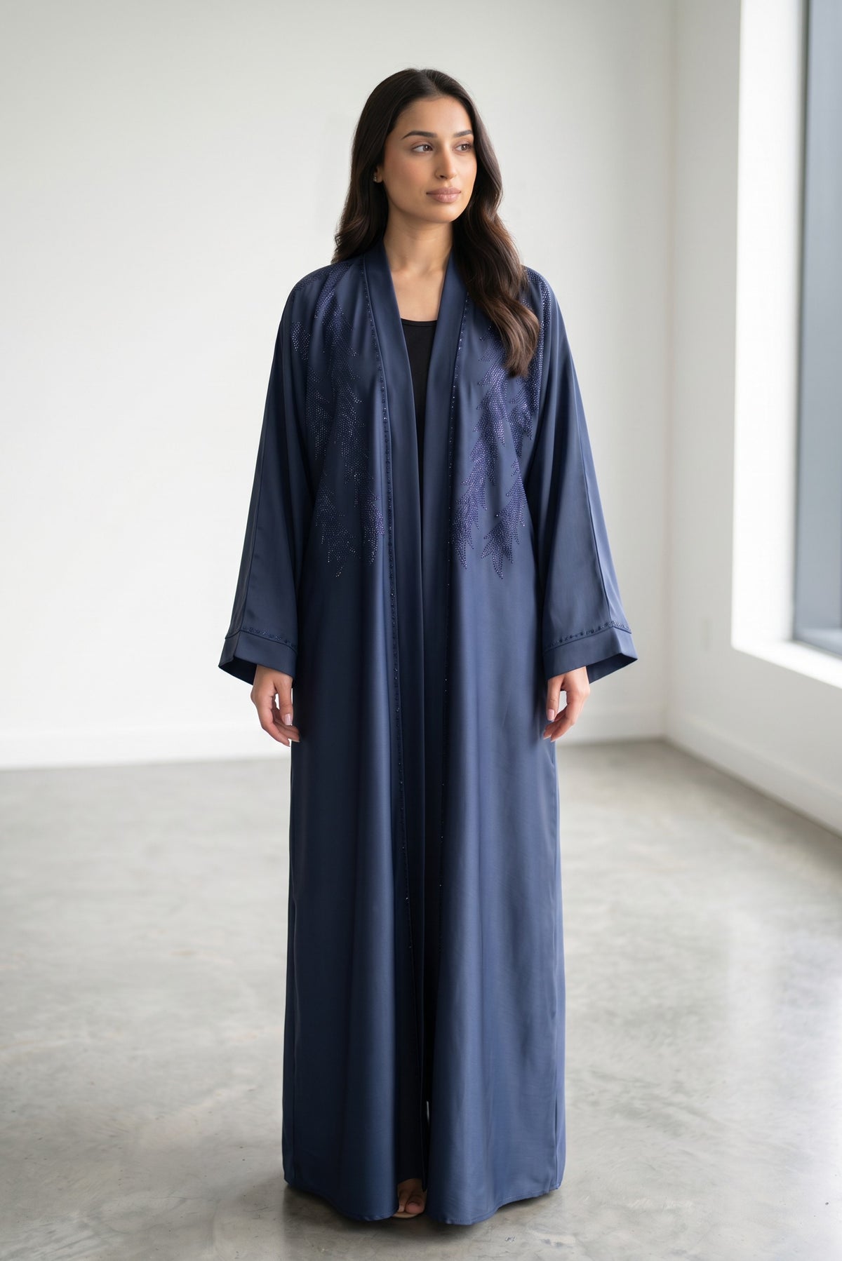 Full-length view of Feather Rhinestone Deep Abaya in Shade: A rich, majestic Midnight Navy Blue