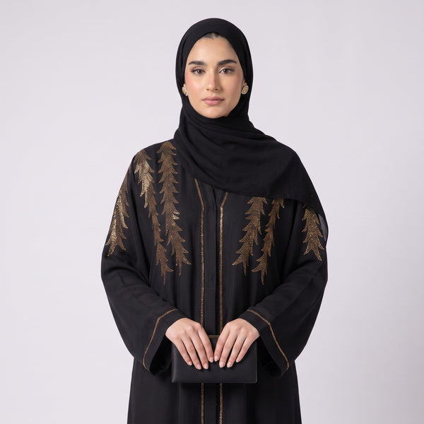 Close-up detail of Golden Feather Rhinestone Abaya showcasing feather and rhinestone embellishment