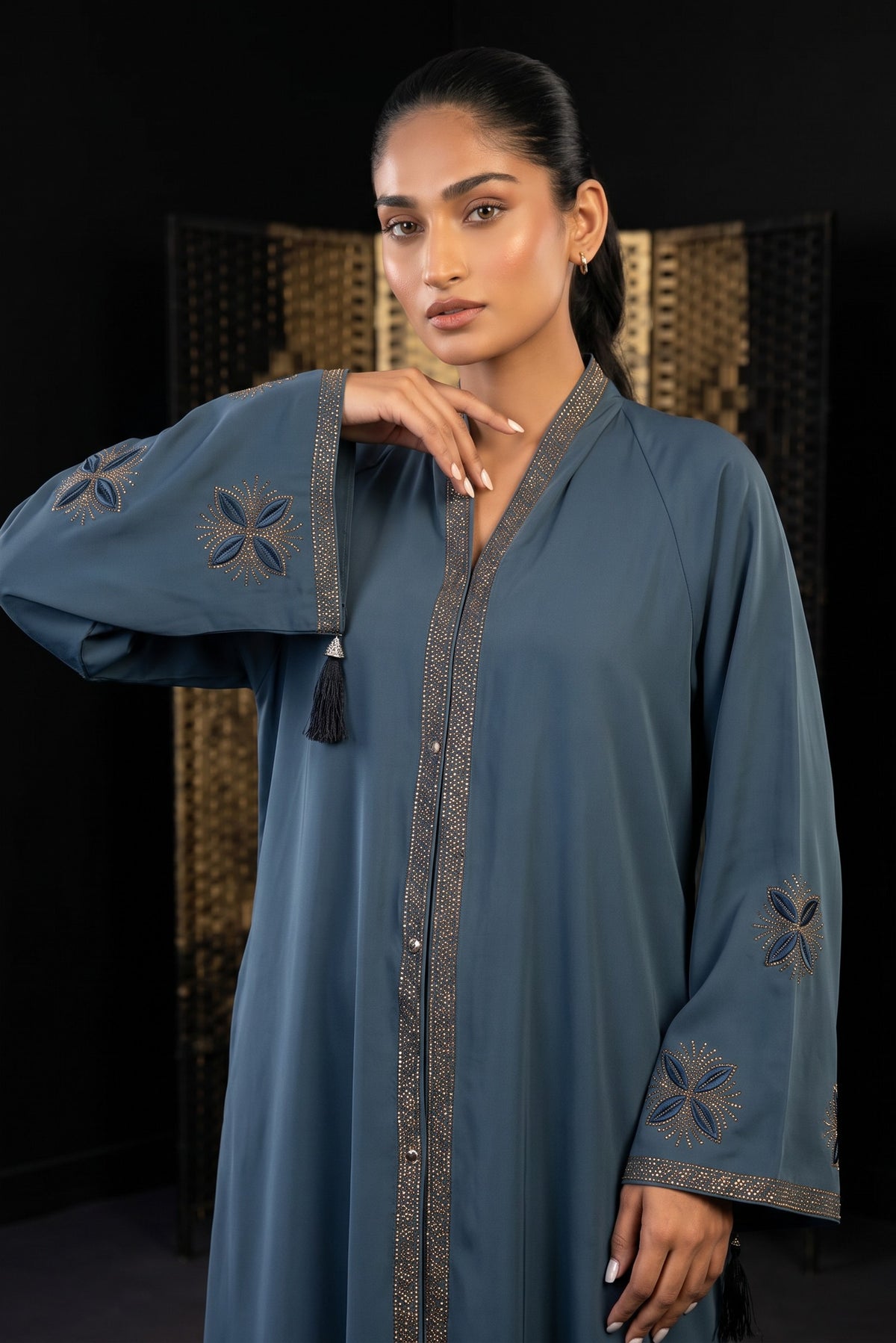 Styled front view of Slate Blue Flared Abaya showing full flare silhouette