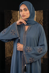Close-up detail of Slate Blue Flared Abaya sleeve embroidery and DMC stones