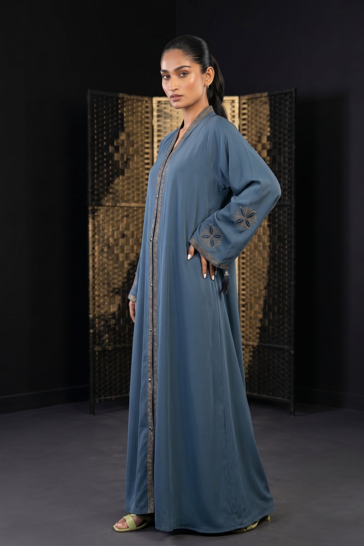 Side view of Slate Blue Flared Abaya showing sweeping flare drape