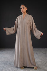 Close-up detail of Taupe Glow Embellished Abaya showcasing DMC shine stones