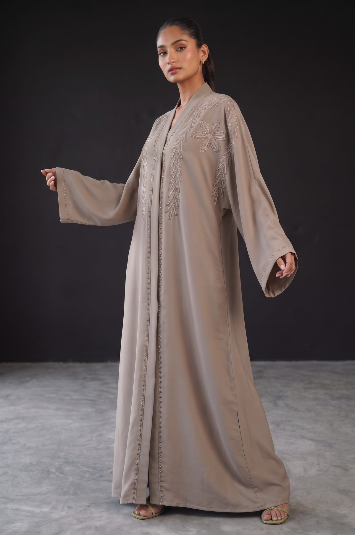 Side view of Taupe Glow Embellished Abaya showing luminous drape