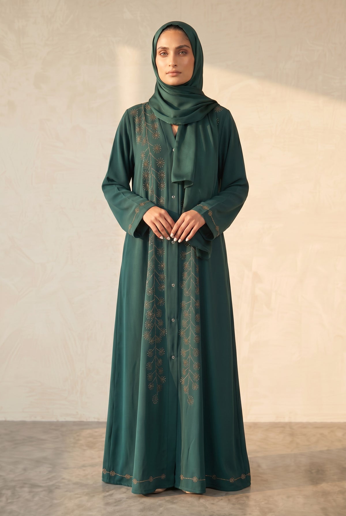 Side profile of Emerald Rhinestone Starburst Abaya highlighting the silhouette