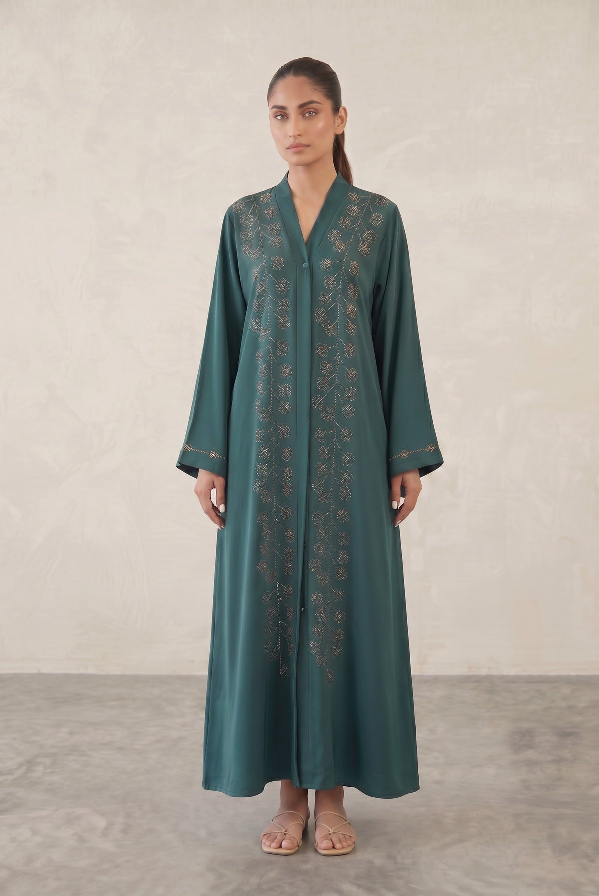 Styled look of Emerald Rhinestone Starburst Abaya, perfect for evening wear, eid celebrations, festive family gatherings, and formal events