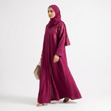 Side profile of Ruby Bloom Embroidered Coat highlighting the silhouette