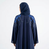 Close-up detail of Sapphire Bloom Embroidered Coat showcasing the design work