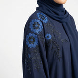 Side profile of Sapphire Bloom Embroidered Coat highlighting the silhouette